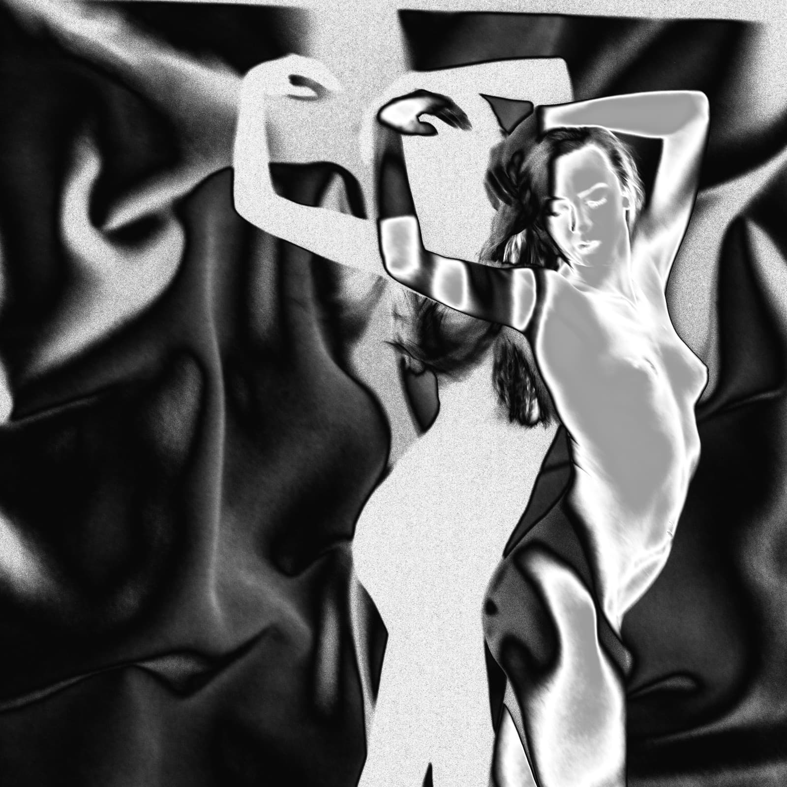 A black and white image showing a person from the waist up against a background of draped fabric. The image is processed with a high-contrast solarised effect that makes the skin appear metallic and glowing. The person has their arms raised above their head with elbows bent, looking slightly downwards to the side.